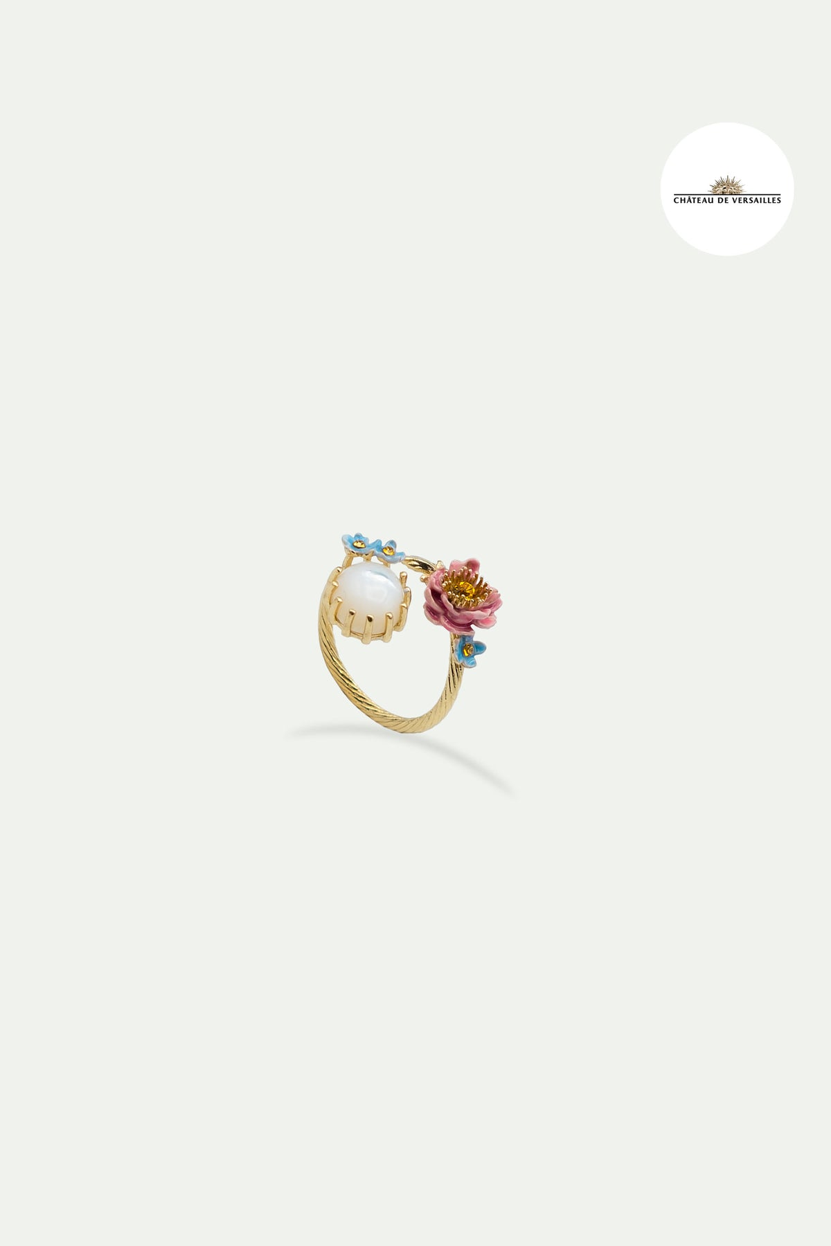 Bague ajustable fleurs rose et bleues et pierre ronde nacrée