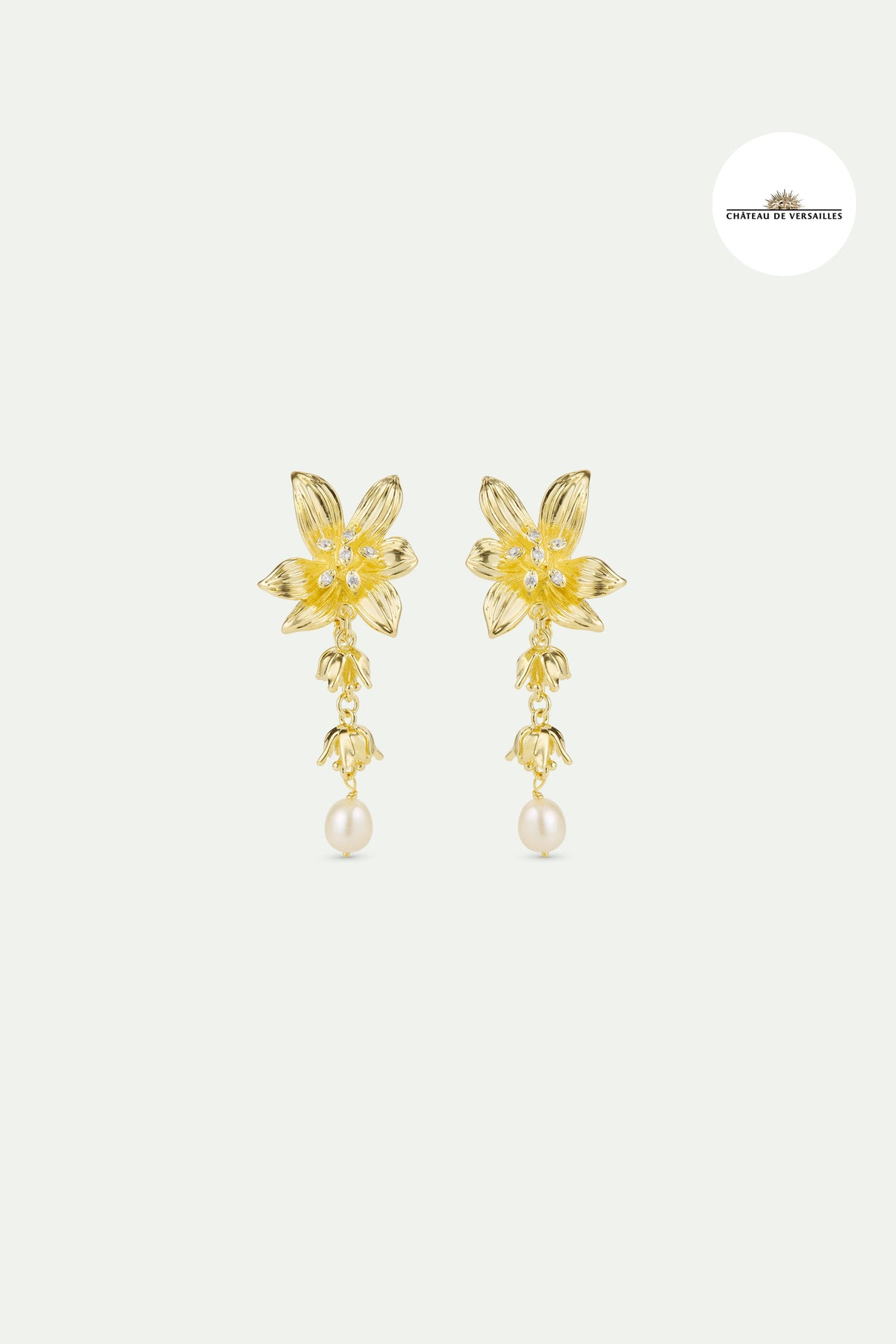 Boucles d'oreilles pendantes dorées fleur de lys et perle de culture