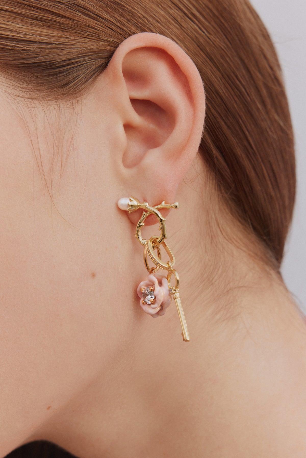 Pendentif clé dorée, Mystères et Liberté