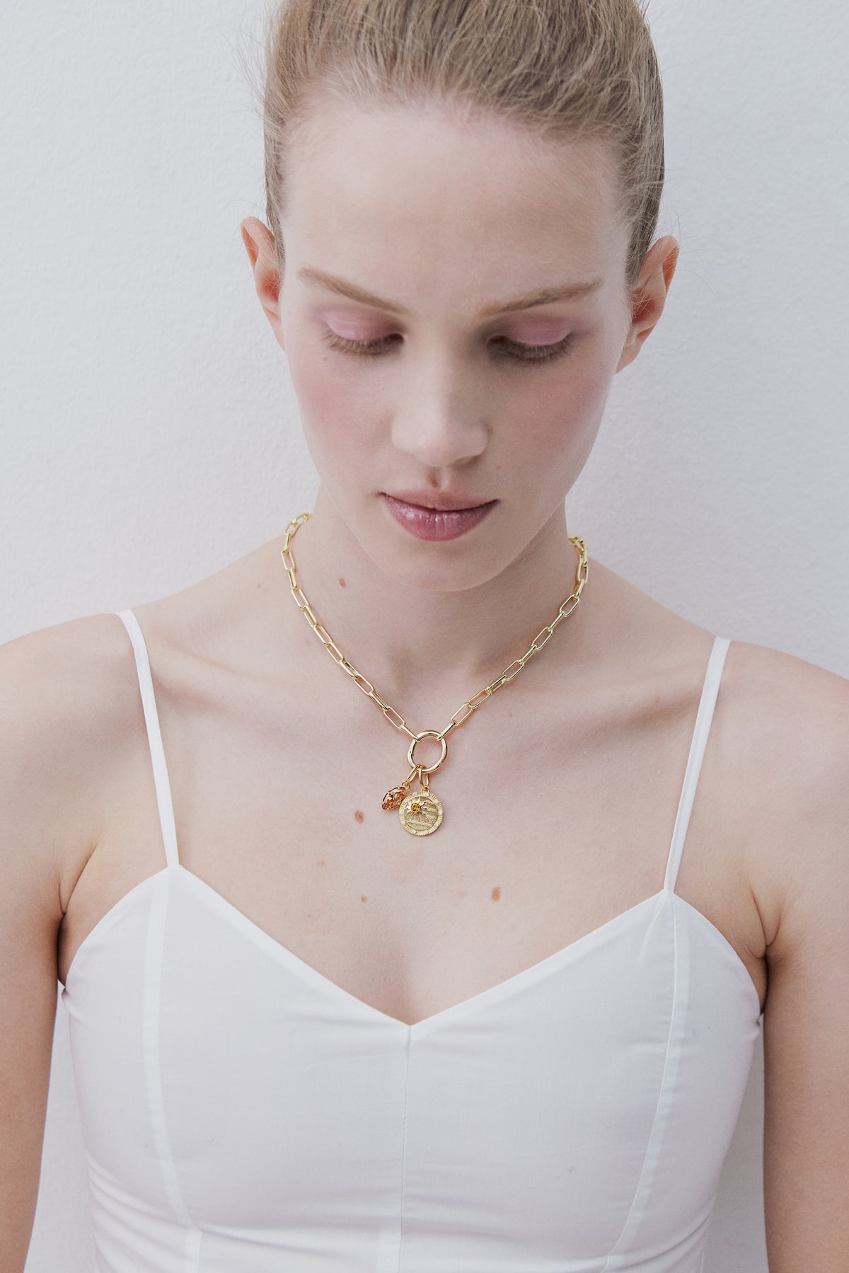 Pendentif Rayon de Soleil doré, Dualisme et Ravissement