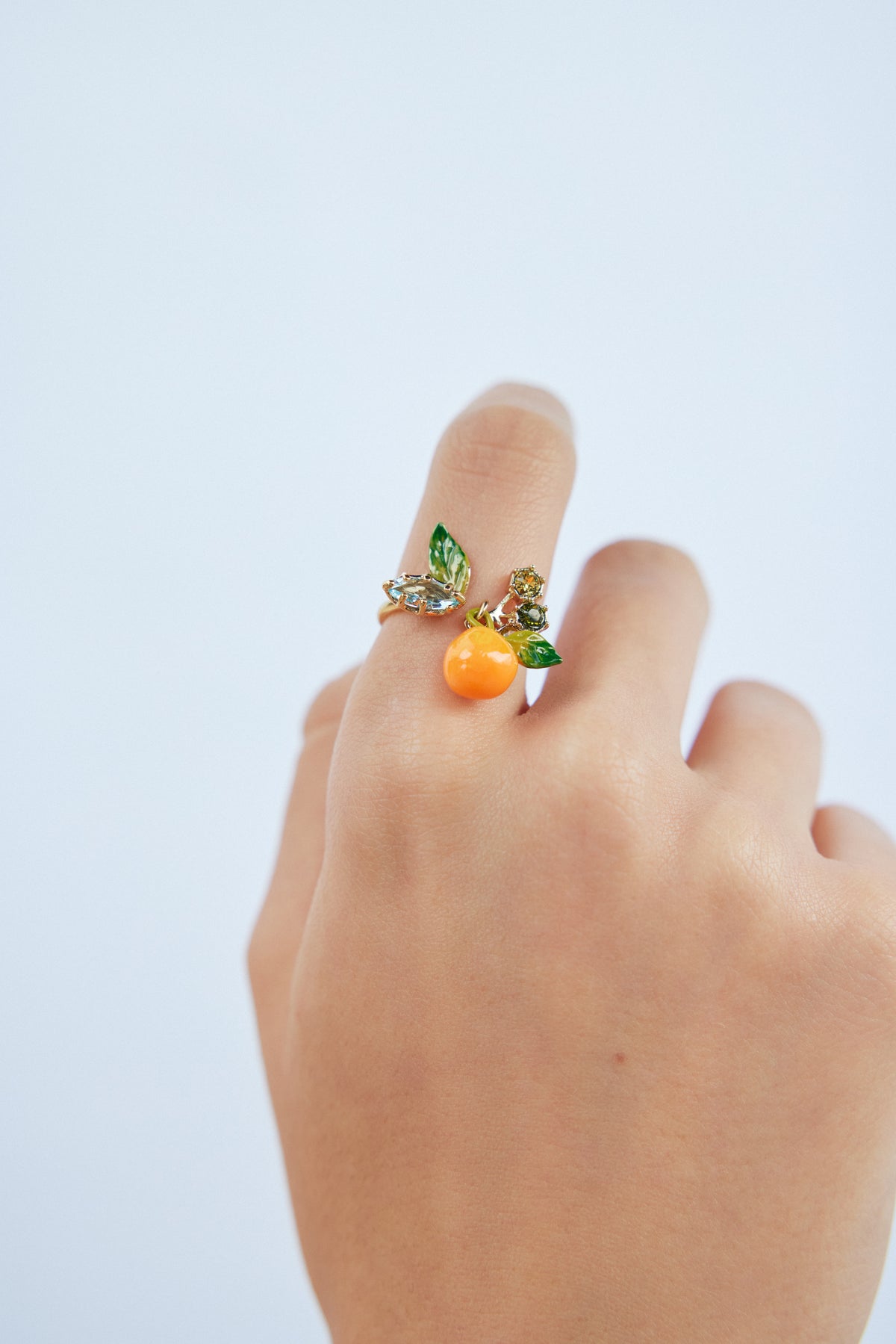 Bague ajustable orange et pierres bleues et vertes