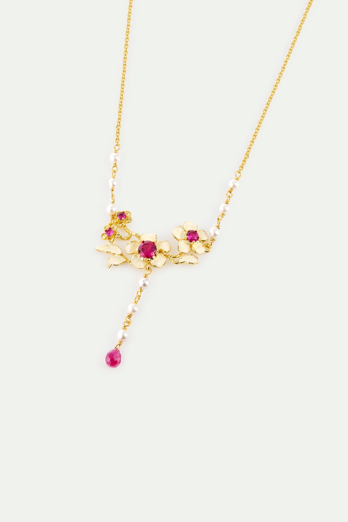 Collier plastron anémones dorées, cristaux roses et perles de culture