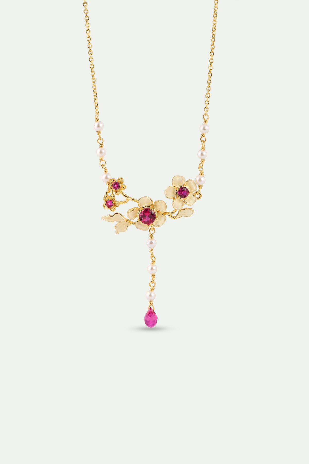 Collier plastron anémones dorées, cristaux roses et perles de culture