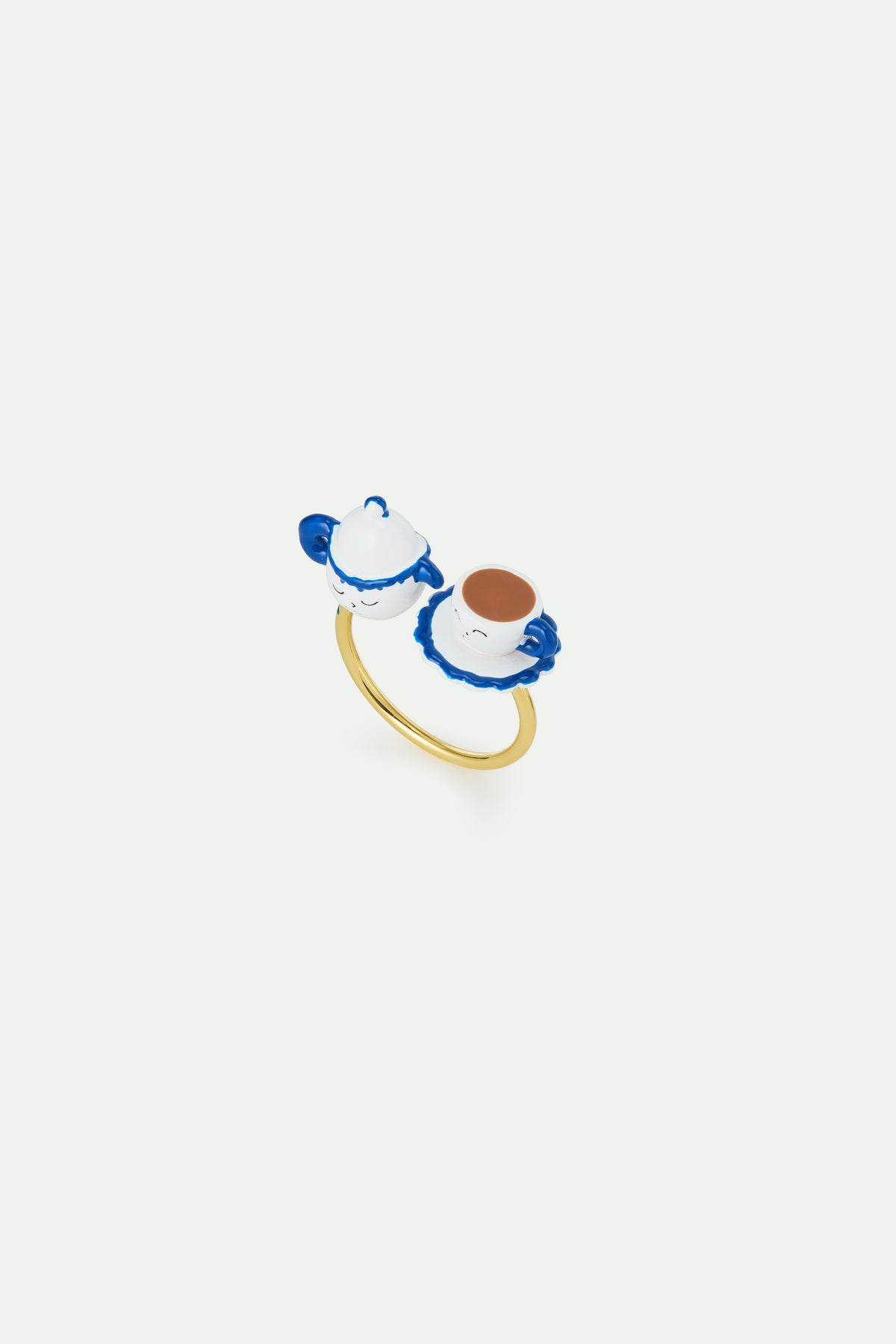 Bague ajustable théière bleue et blanche, et petite pierre jaune