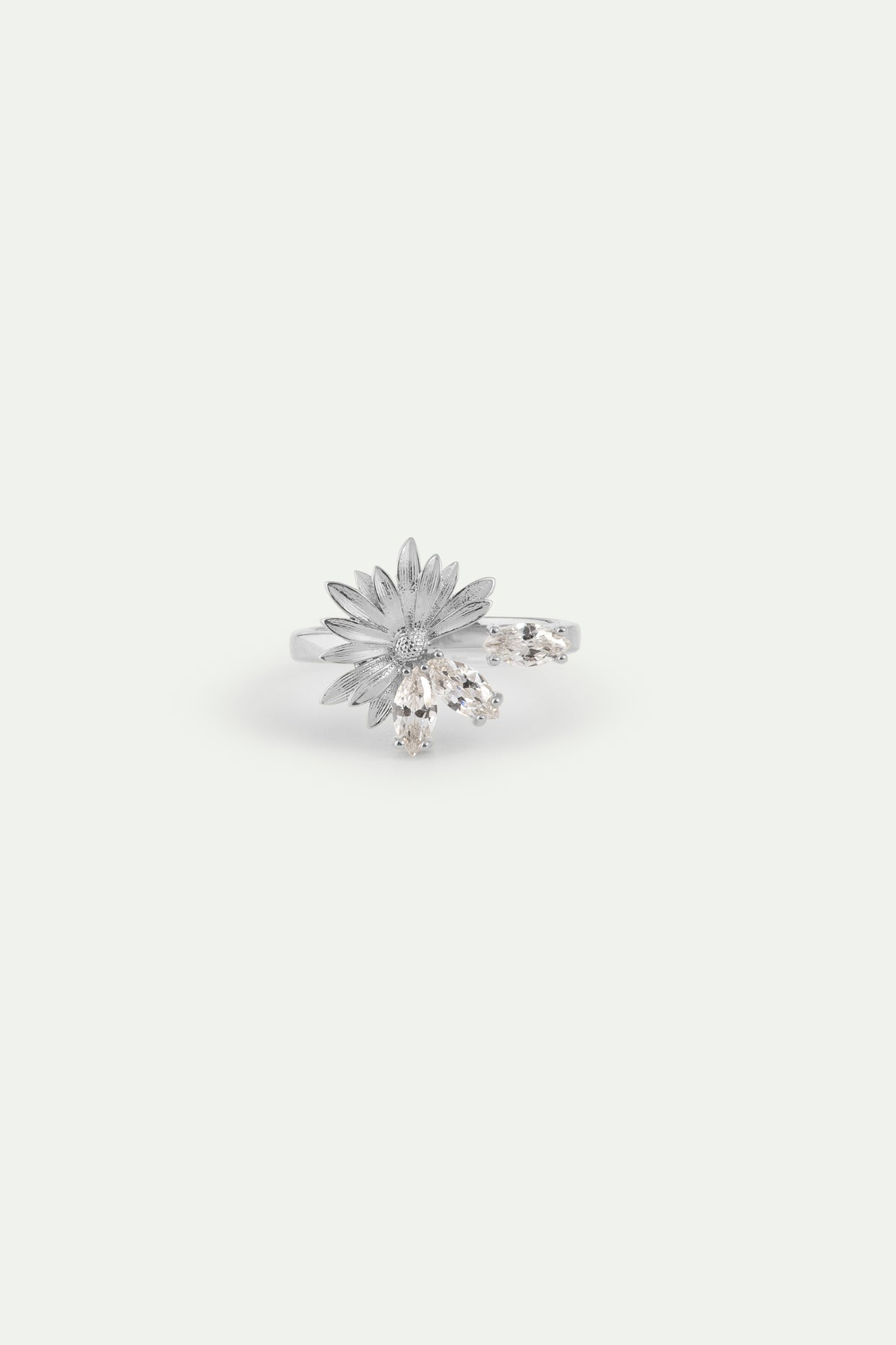 Bague ajustable argentée fleur de marguerite et pierres blanches