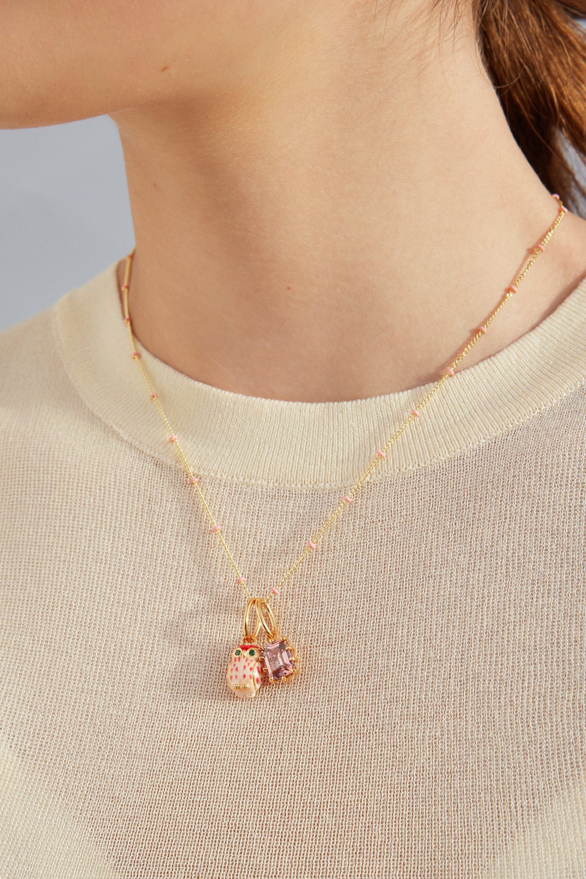 Golden chain and pink beads
