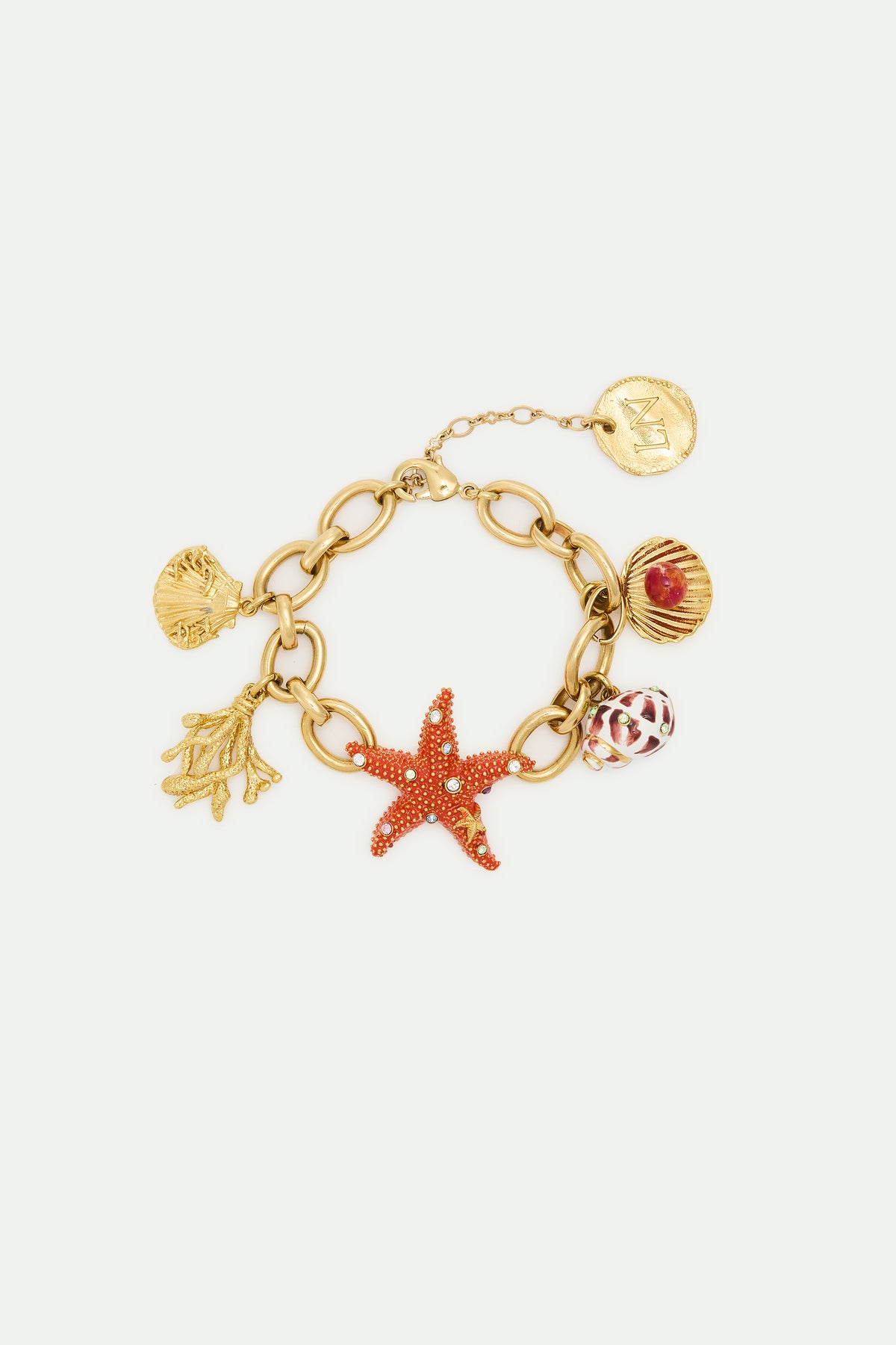 Bracelet doré étoile de mer et pendentifs coquillages
