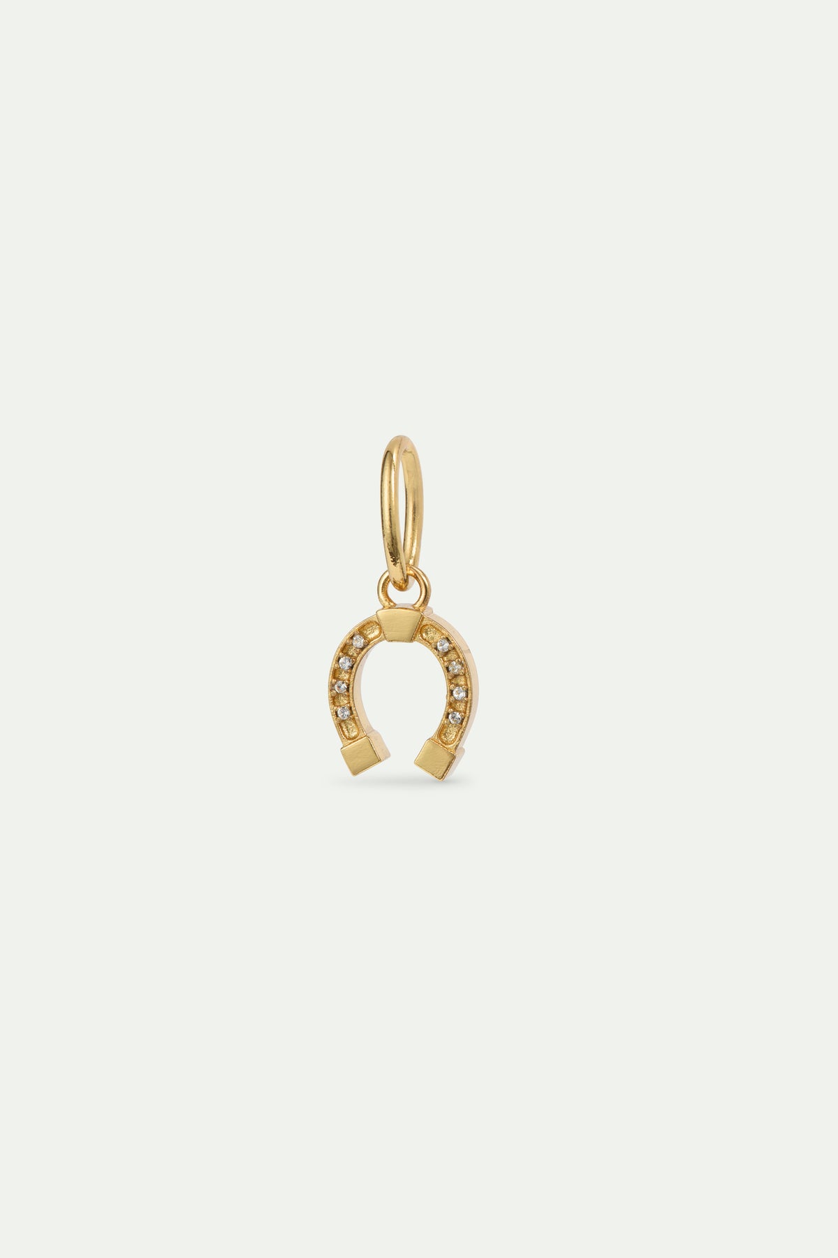 Pendentif Fer à cheval doré, Conjuration et Abnégation