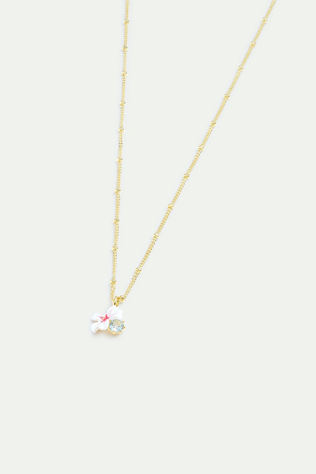 Collier pendentif aubépine blanche et rose et cristal bleu