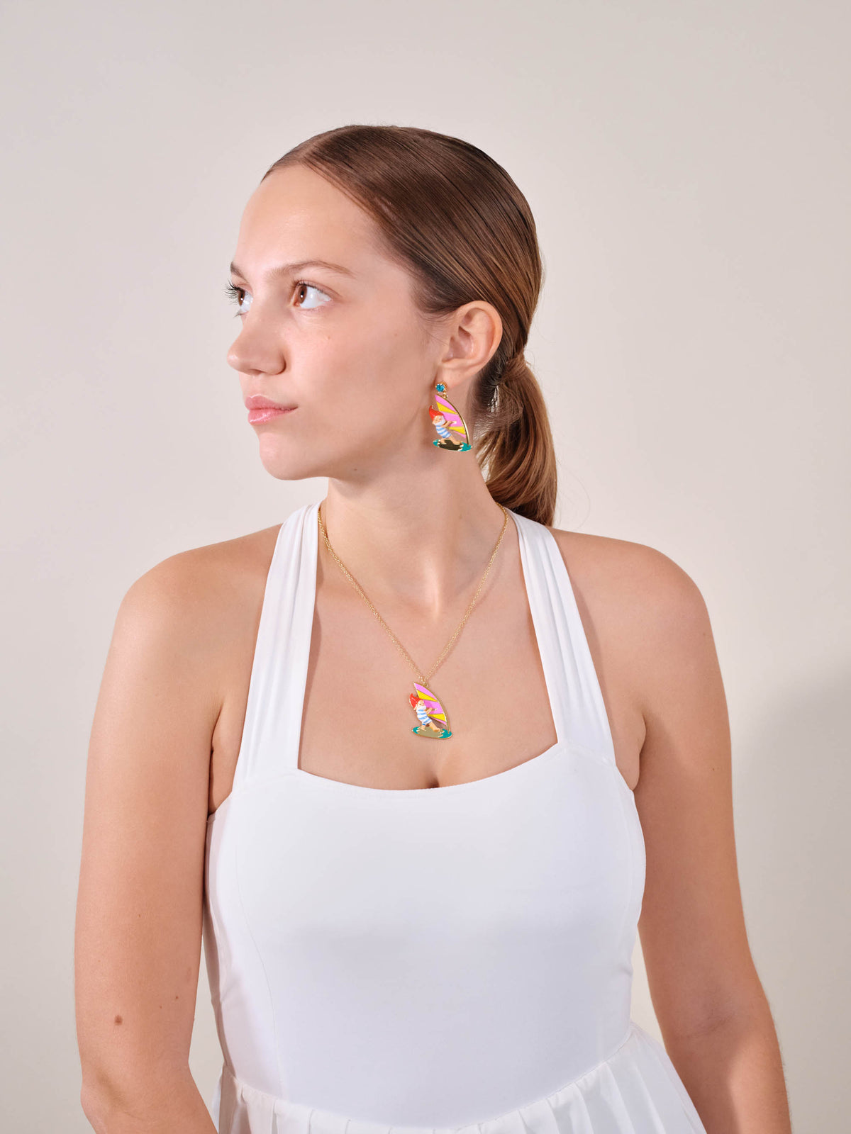 Surfing garden gnome pendant necklace