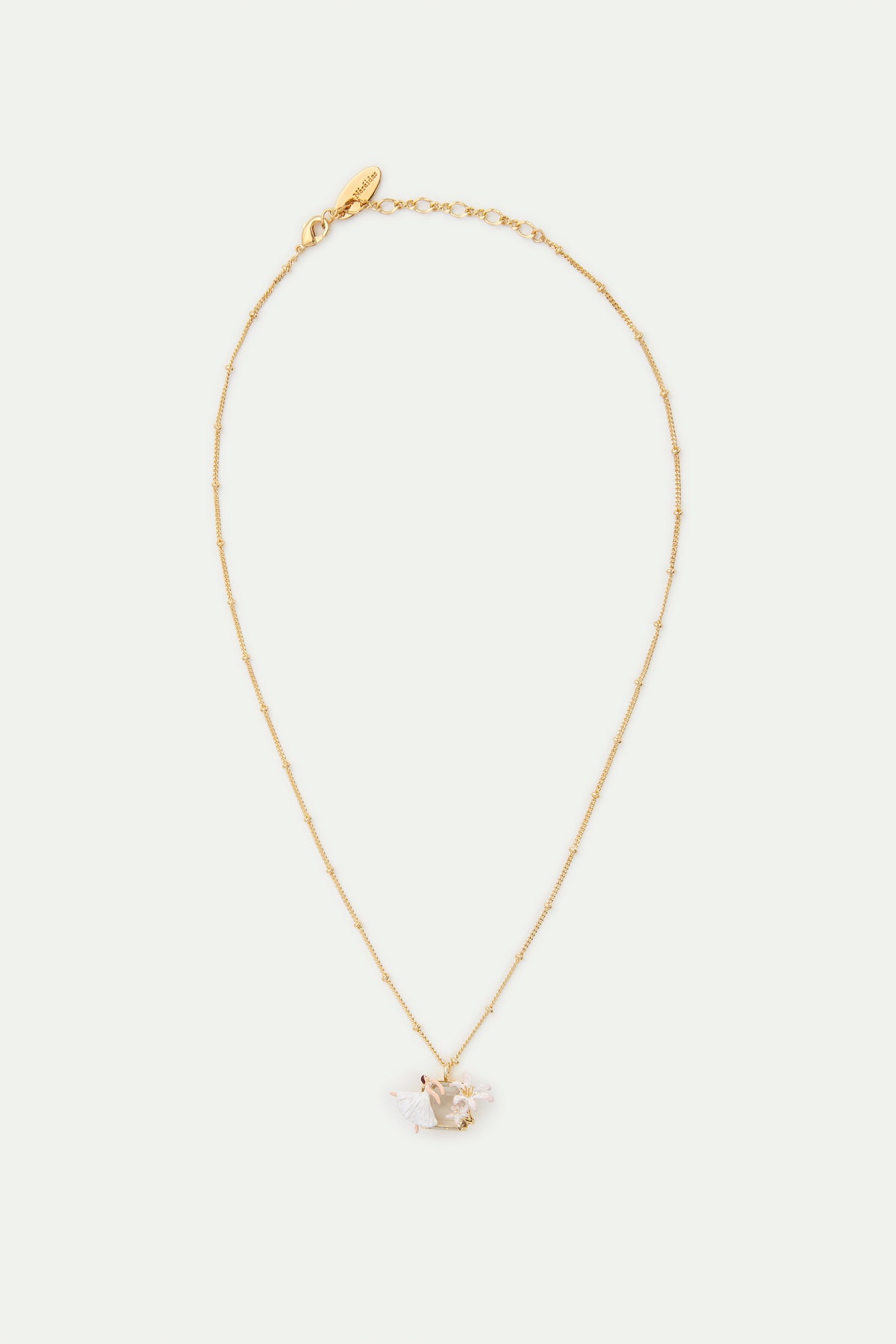 Collier pendentif Ballerine, Fleur de Lys, et pierre facettée