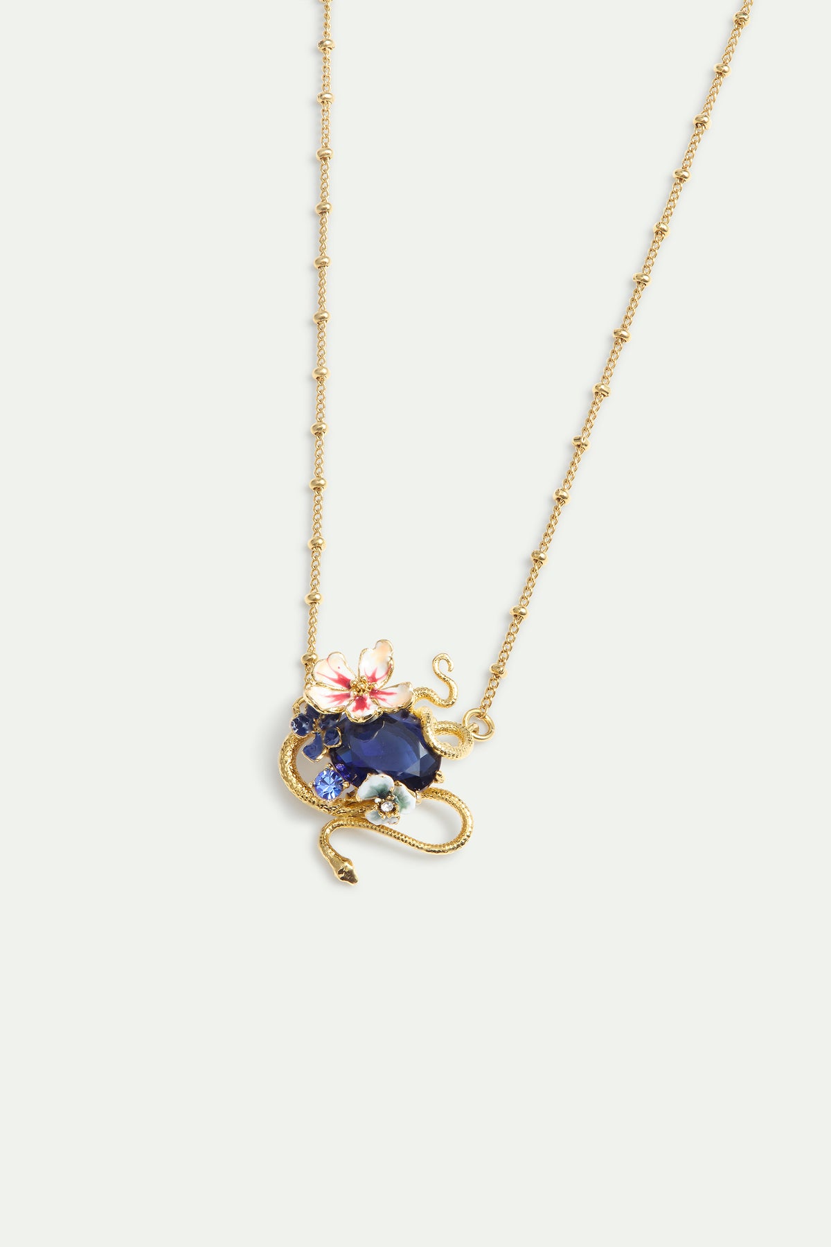 Collier pierre facettée bleue, serpent doré et fleurs de Mauve