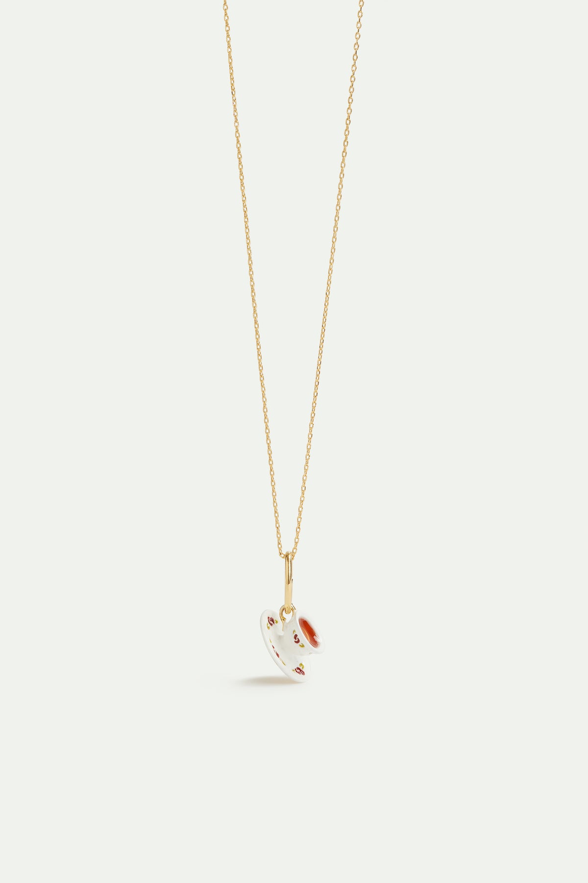Pendentif tasse de thé, Quiétude et Raffinement