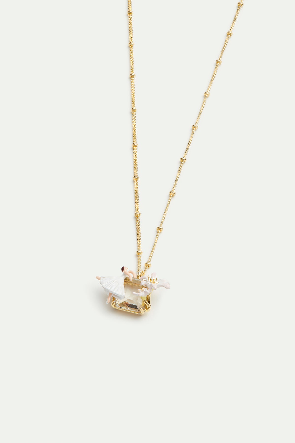 Collier pendentif Ballerine, Fleur de Lys, et pierre facettée