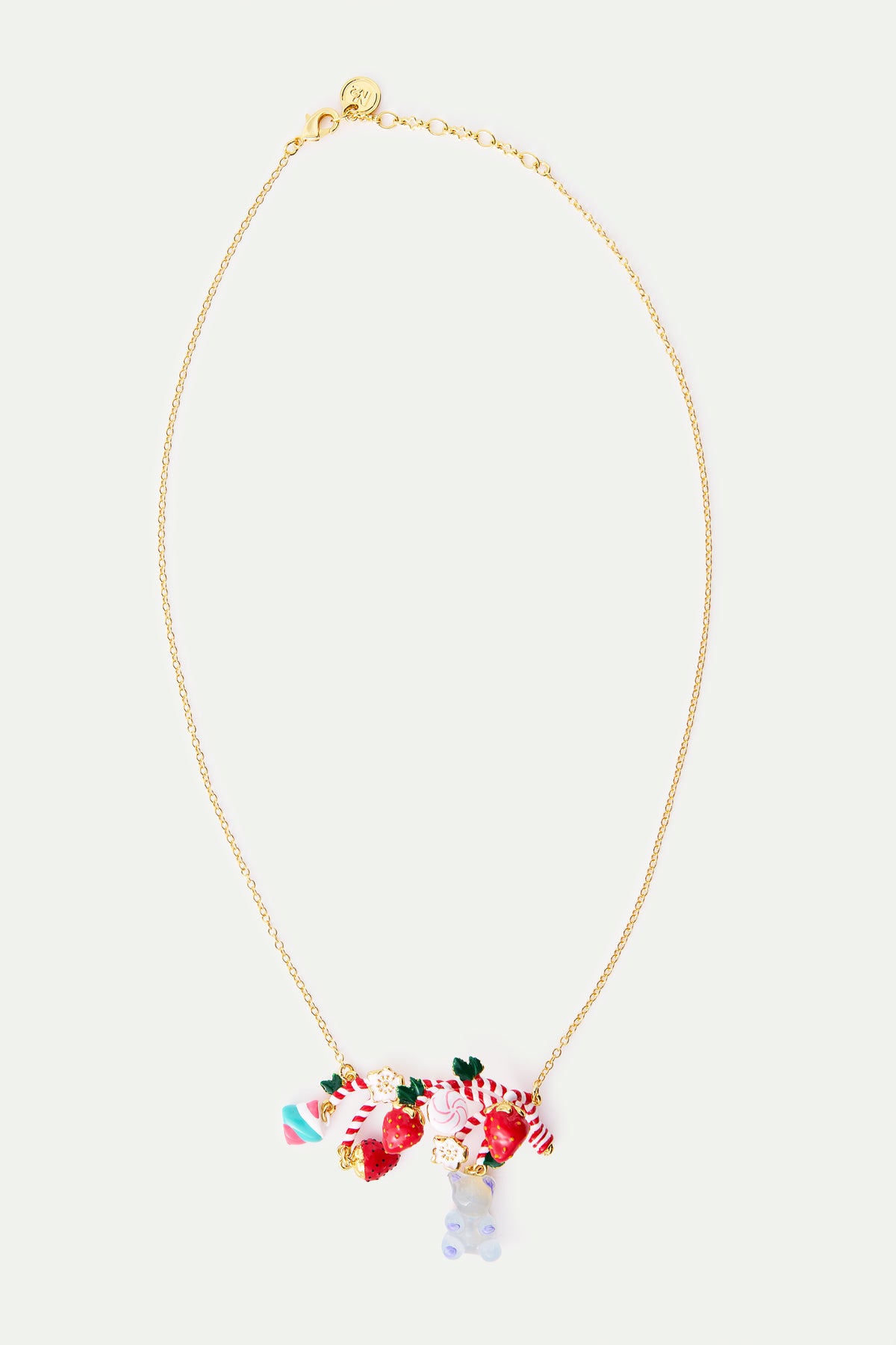 Collier plastron bonbon sucre d'orge, fraises, guimauve, nounours candy bleu et fleurs blanches