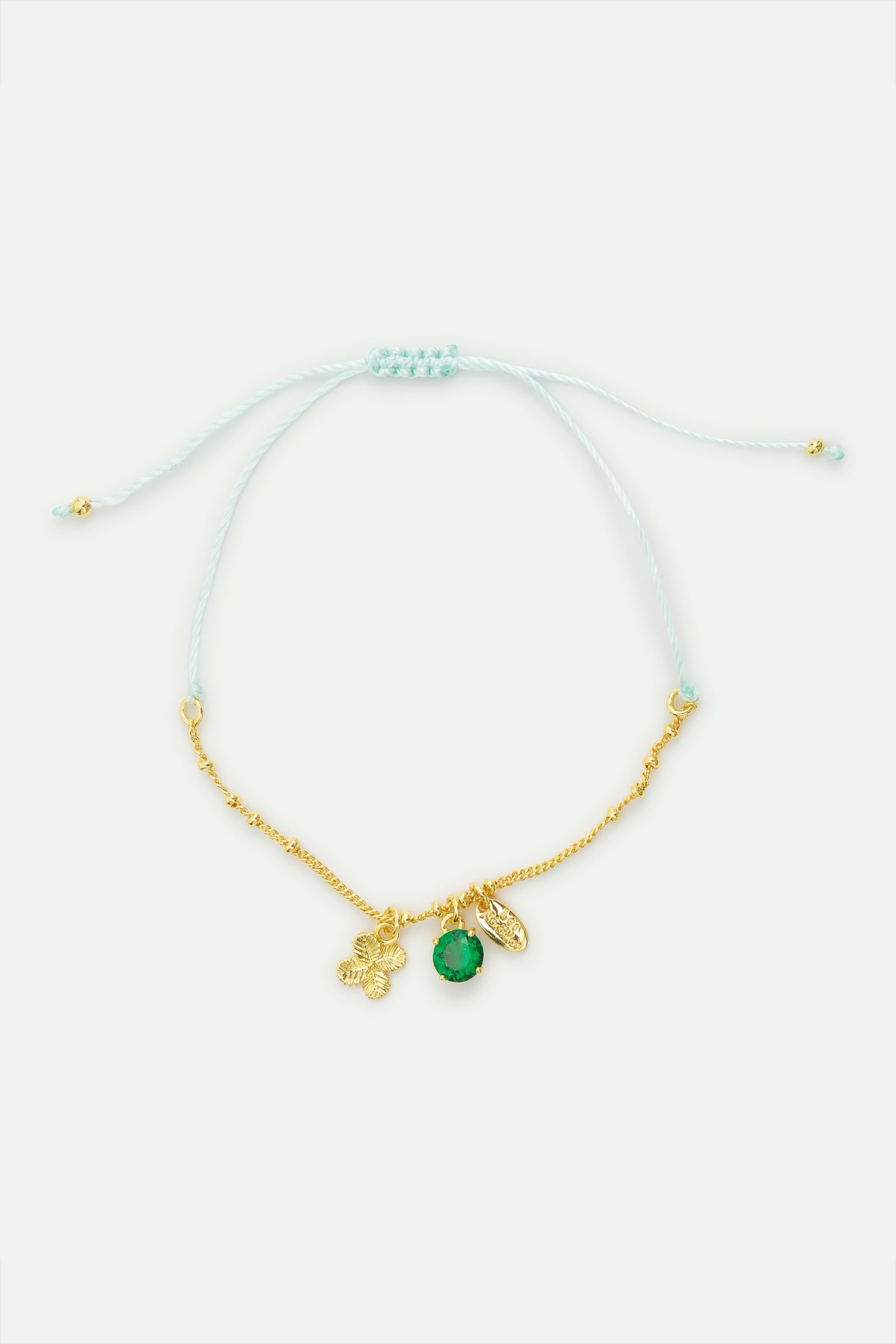 Bracelet fin pendentif trèfle doré et cristal facetté vert