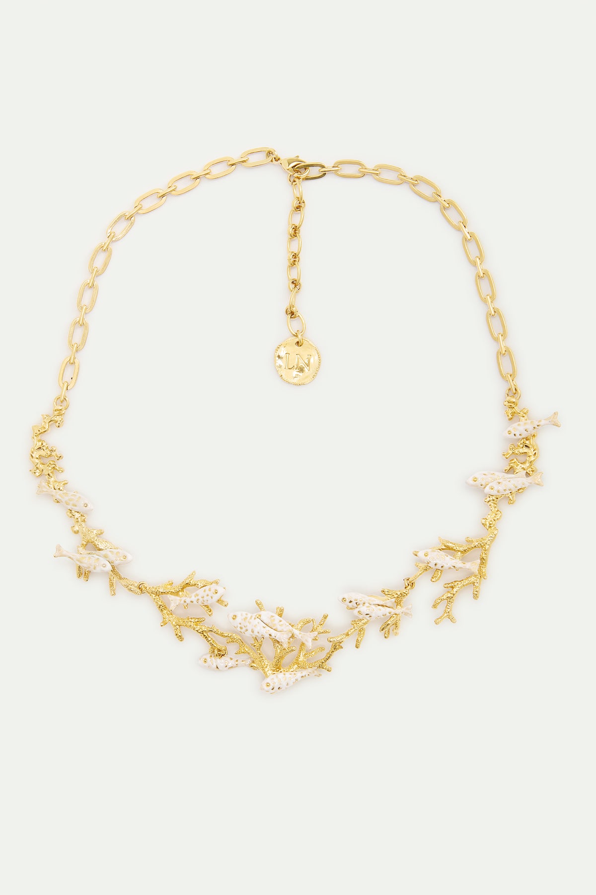 Collier plastron coraux dorés et poissons blancs