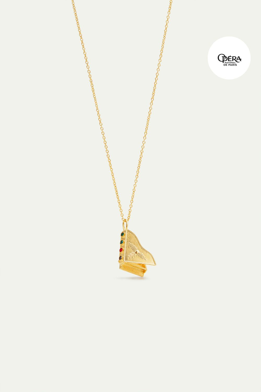 Collier pendentif piano doré