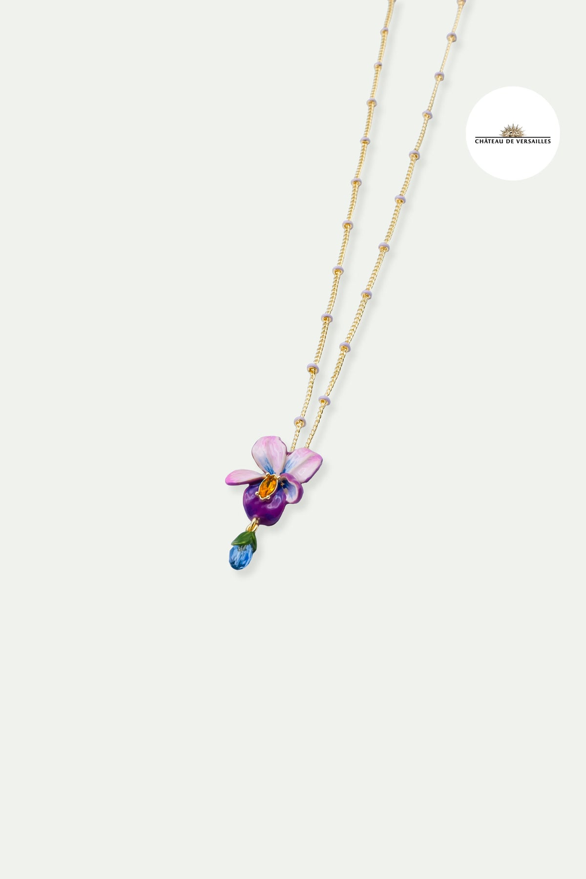 Collier pendentif chaine perlée fleur de violette et pierre bleue pendante