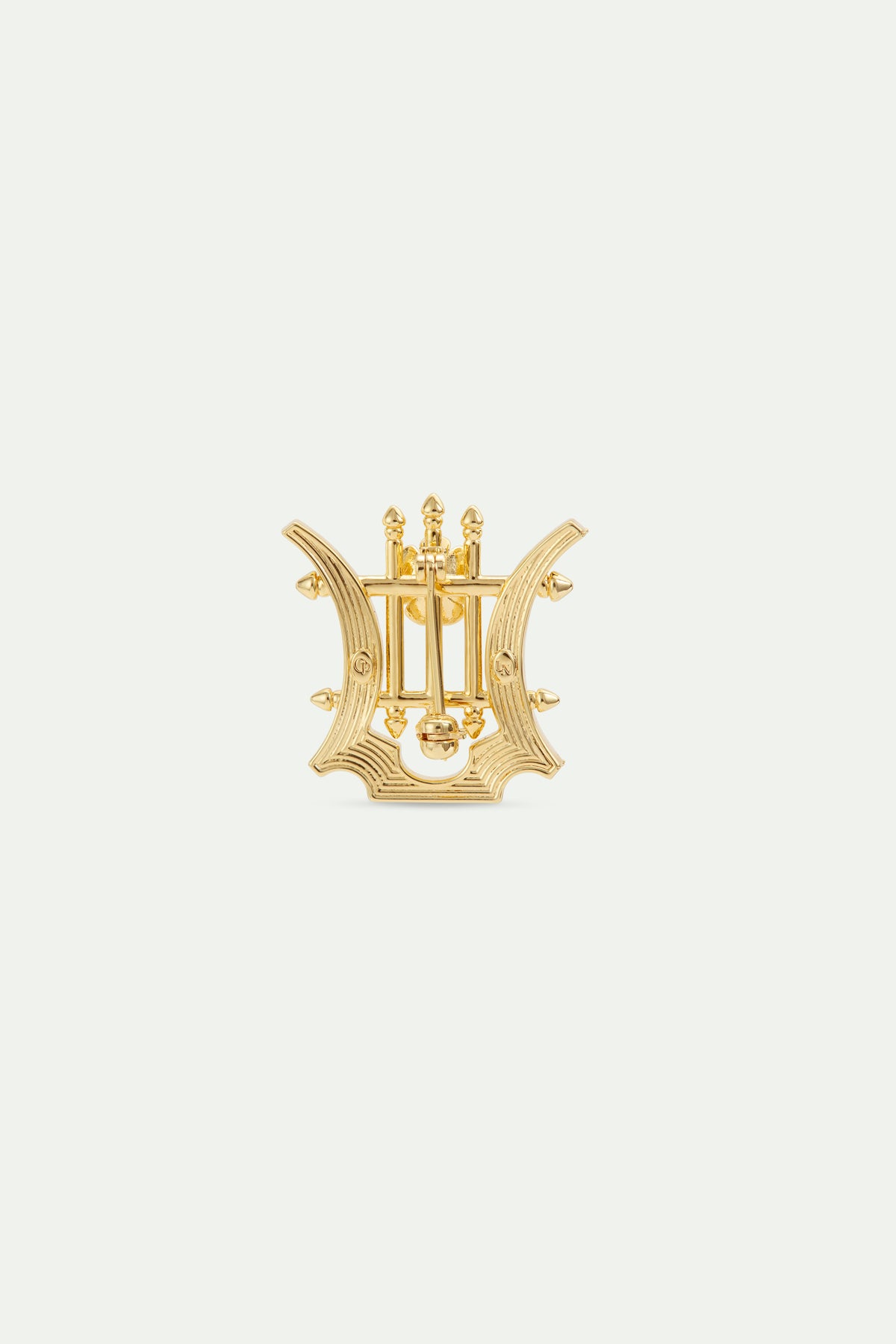 Broche Lyre dorée et cristaux