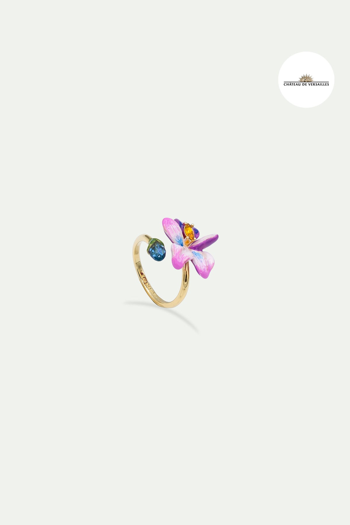 Bague ajustable fleur de violette et pierre taillée bleue